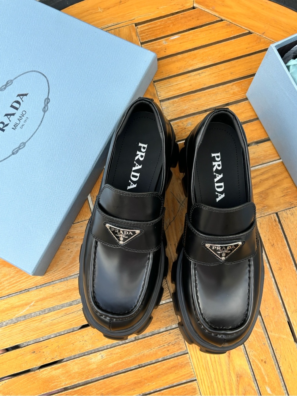 Prada Black Leather Lug-Sole Penny Loafers
